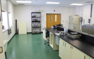 This image shows a kitchen with green epoxy floor.